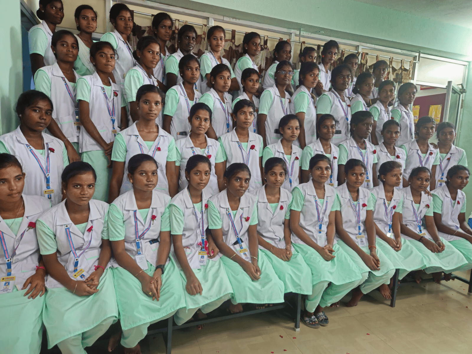 Vinayaga nursing college batch photo – GNM students in white and green uniforms posing for group photograph